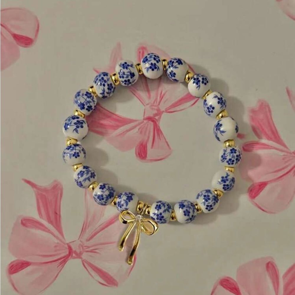 Floral Beaded Bracelet with Gold Bow